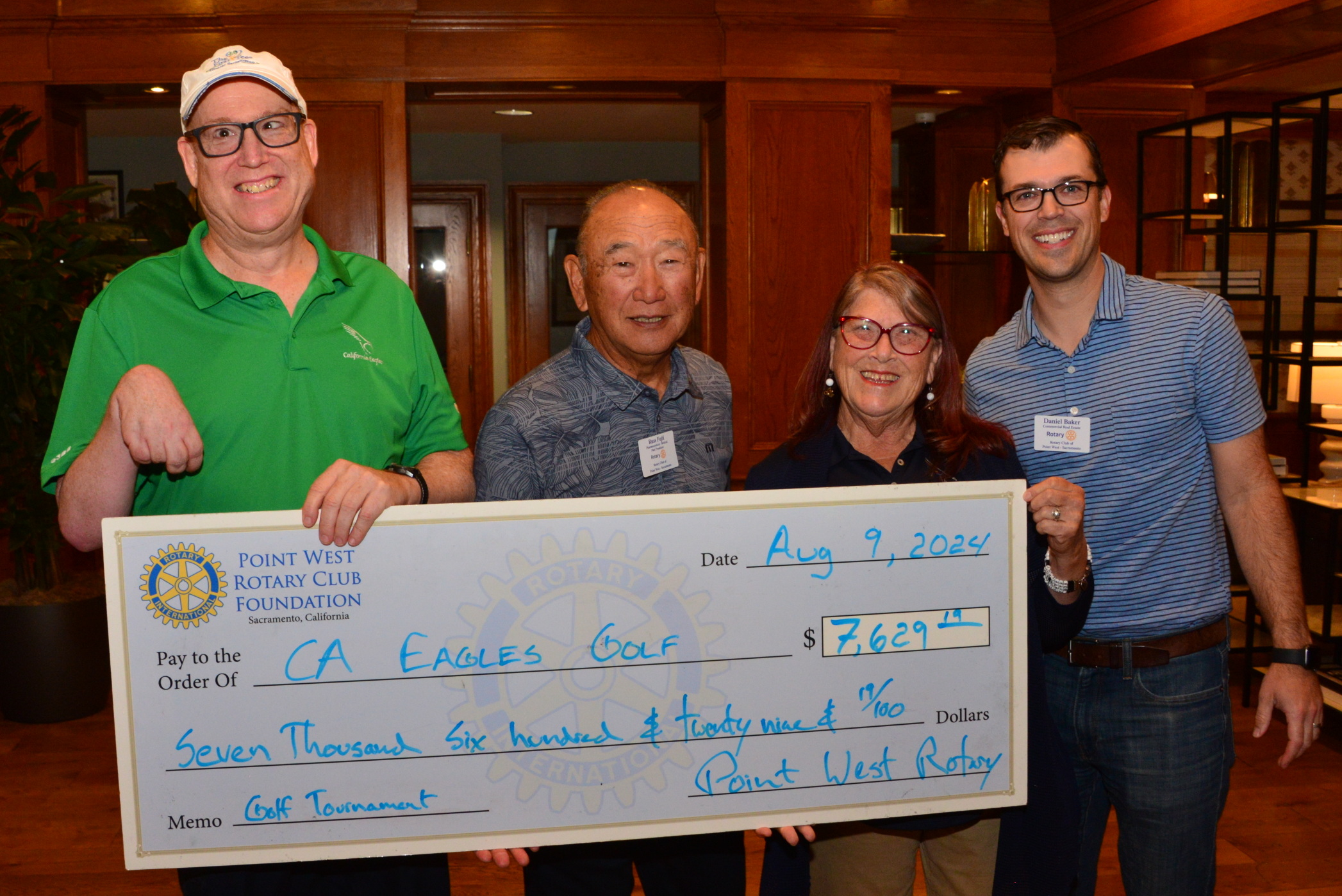 Photo of Eagle Golf check presentation